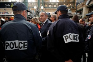 1197534-checknews-french-junior-interior-minister-laurent-nunez-talks-with-policemen-during-a-patrol-at-the-